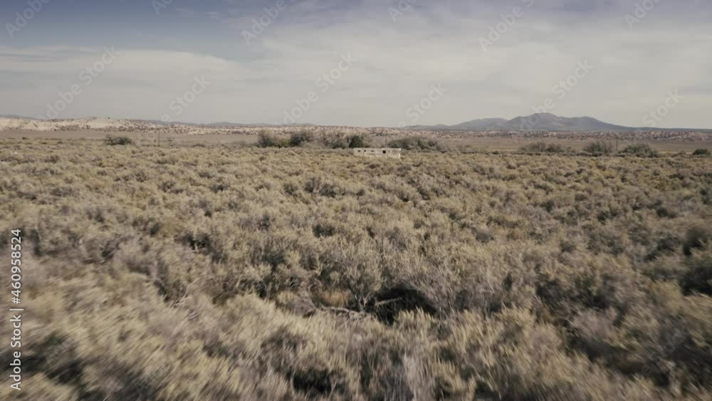 Aerial: Abandoned RV trailer in the desert. Bennett Springs, Nevada, USA Aerial: Abandoned RV trailer in the desert. Bennett Springs, Nevada, USA