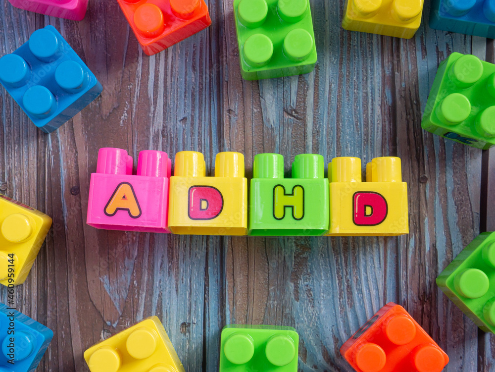 Naklejka premium brick toys multi color adhd word for sci or education concept