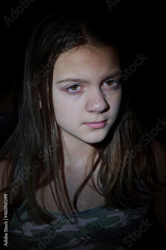 Facial portrait of cute teenage girl with long hair