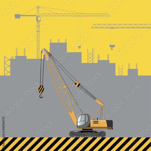 Hydraulic crawler self-propelled crane. Construction machinery on the background of a building under construction.