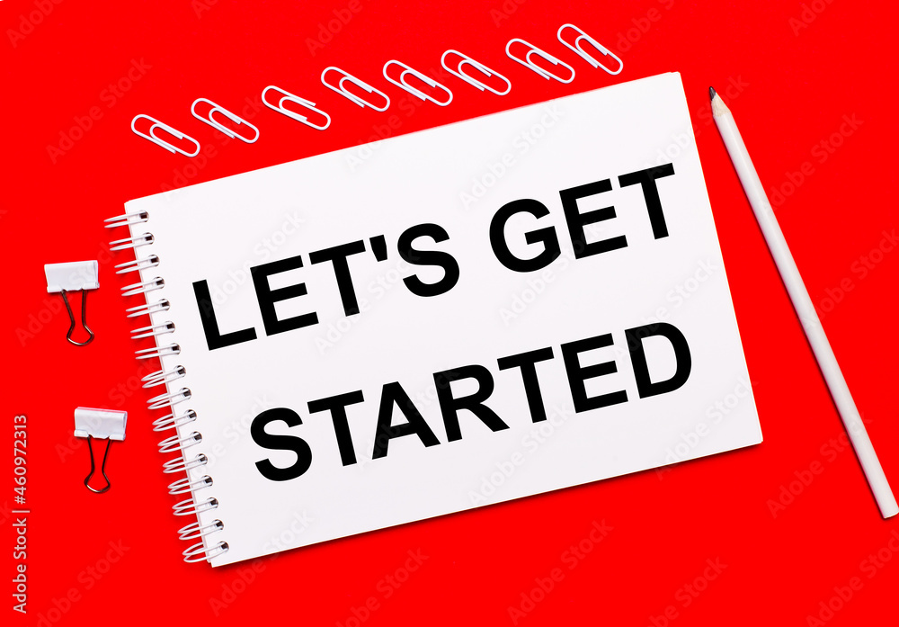 On a bright red background, a white pencil, white paper clips, and a ...