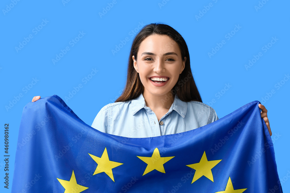 Young woman with flag of European Union on color background Stock Photo ...