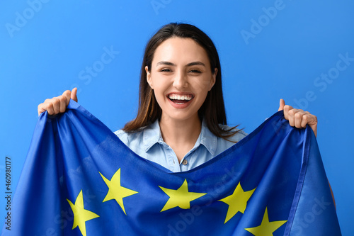 Young woman with flag of Eu...