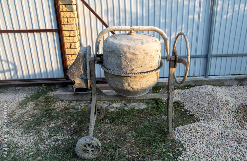 Concrete mixer at a construction site. Concrete mixer at a construction site.