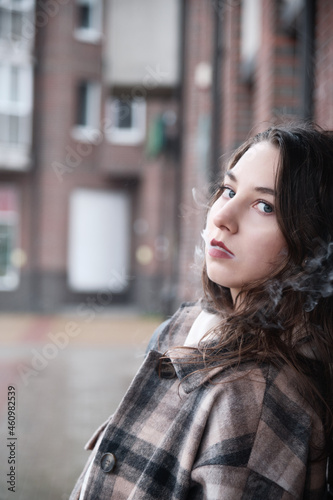 young woman smoking © tugolukof