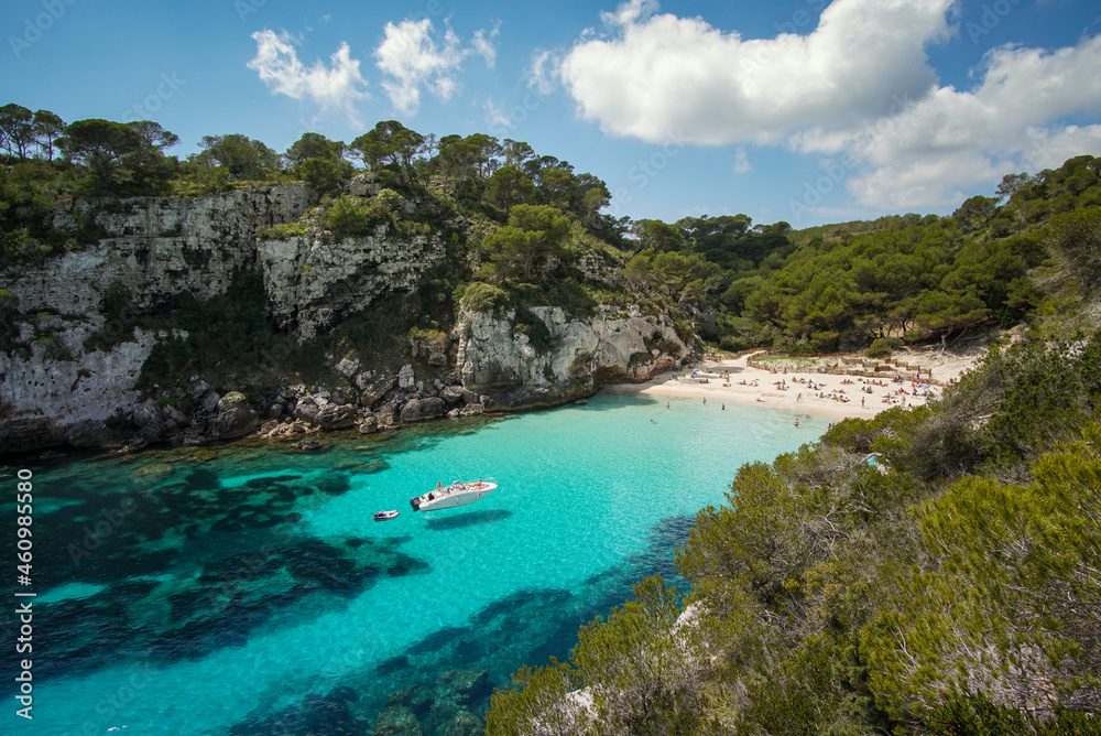 Beautiful beach Cala Macarelleta on a sunny vacation day in Menorca, Spain