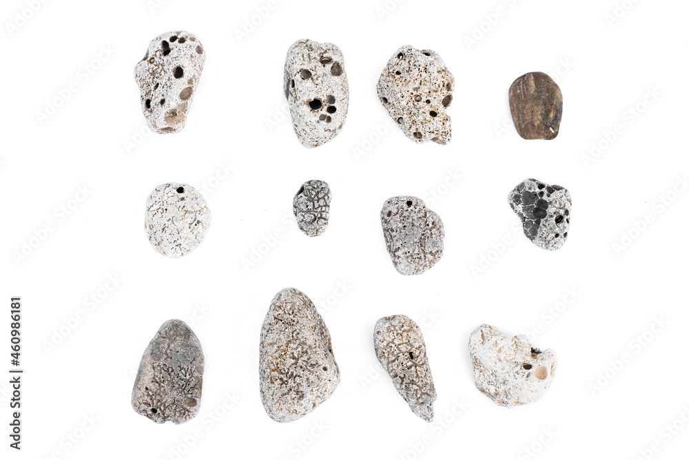 Various sea pebbles stones isolated on the white background. Various sea pebbles stones isolated on the white background.