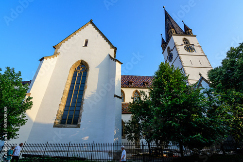 Renovated old historical building of Lutheran Cathedral of Saint Mary (Catedrala Evanghelica Sfanta Maria)  in the old city center of Sibiu, in Transylvania (Transilvania) region, Romania   photo