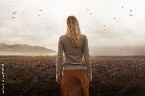 Φωτογραφία free woman walks towards infinity in the midst of nature