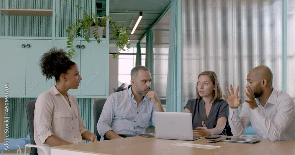 Business executives in a meeting discussing ideas Business executives in a meeting discussing ideas