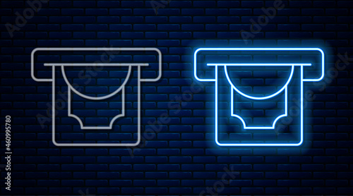 Glowing neon line ATM - Automated teller machine and money icon isolated on brick wall background. Vector