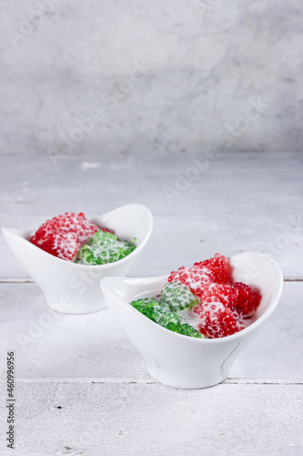 Sago Gula Melaka. Sago tapioca pearls drenched with coconut milk and palm sugar. Bubur mutiara.