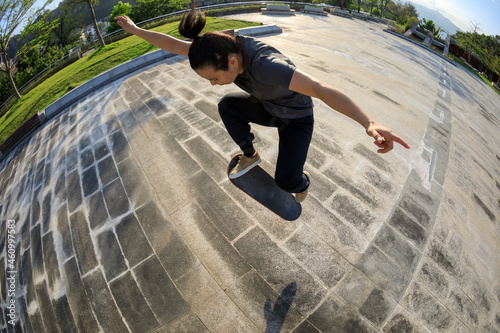 Skateboarder skateboarding outdoors in city photo