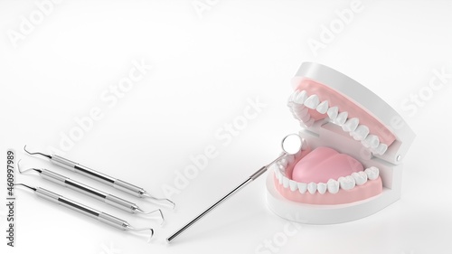 歯の模型とスケーラーの3Dレンダリング