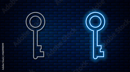 Glowing neon line Old key icon isolated on brick wall background. Vector