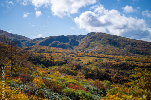                                                                                                                                              A view of climbing Mt. Kurikoma in Kurihara City  Miyagi Prefecture  Yuzawa City  Akita Prefecture  during the autumn foliage season.