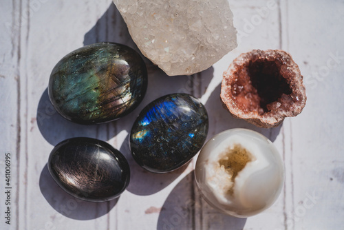 colorful crystals and stones on white background