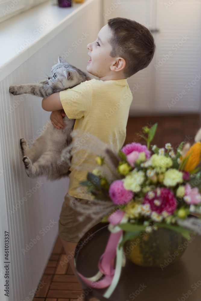 Child, cat and bouquet in pumpkin Child, cat and bouquet in pumpkin
