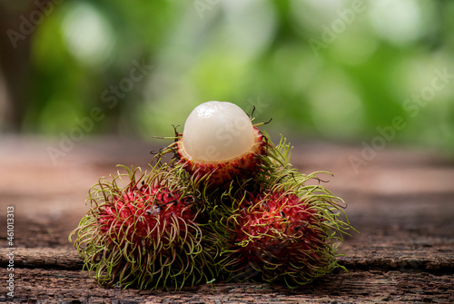 Rambutan or nephelium lappaceum fruits on nature background. photo