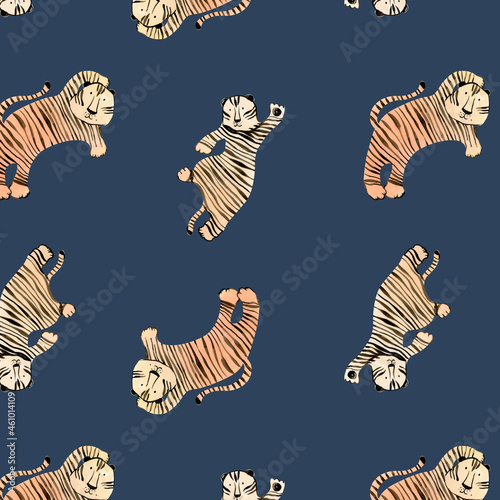 Watercolor cute tigers seamless pattern  on blue background. Great for wrapping paper, nursery decor, kids fabric. New year2022 symbol wild tiger on dark blue photo