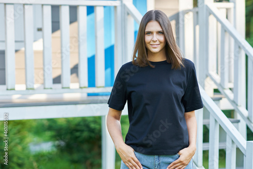 Young woman in black shirt Free Download Young woman in black shirt - GFXLoad