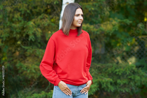 Young woman in red blouse