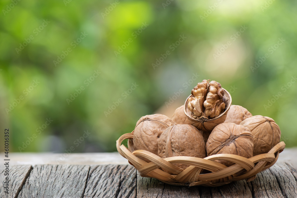 Dried walnut fruits on nature background. Dried walnut fruits on nature background.