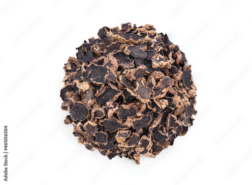 Dried black galingale slices isolated on white background with clipping path.top view,flat lay.