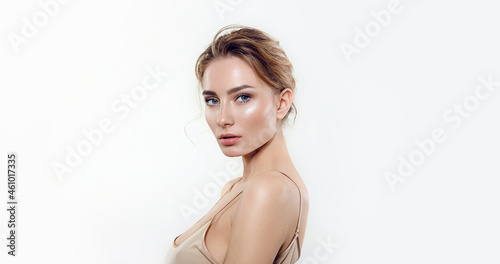 Portrait of a young woman with natural makeup and natural styling.Advertising natural cosmetics.Advertising for a beauty salon.Care cosmetics, face and body skin care.