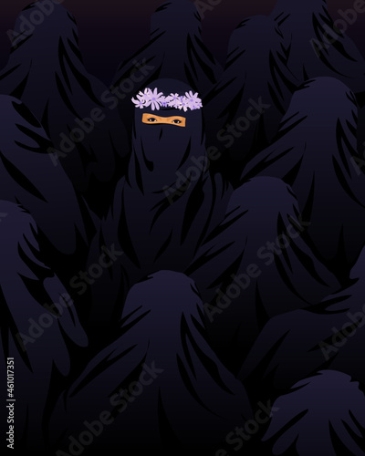 Spotlight on Arab woman wearing burka in crowd