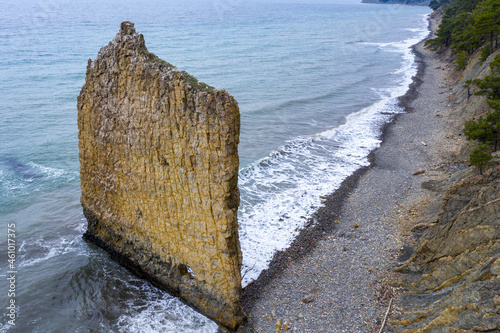 Drone view of Sail Rock (Parus Rock) and Black Sea on cloudy winter day. Praskoveevka, Krasnodar Krai, Russia. photo