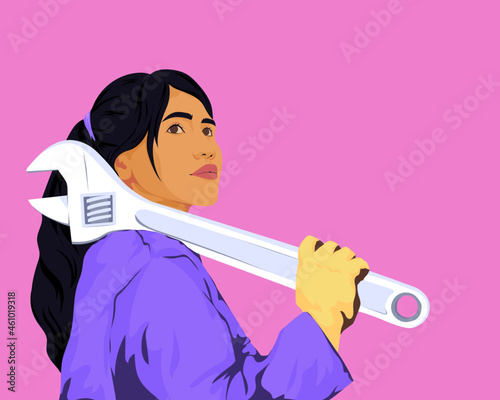 Young female mechanical engineer with wrench