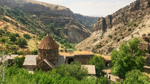 Panoramic view Gndevank monastery with mountains background. Historical sightseeing landmarks in Armenia. photo