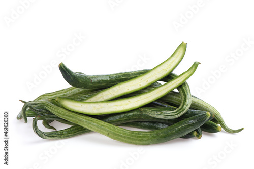 Snake gourd or Trichdsanthes cucumerina green fruits isolated on white background. photo