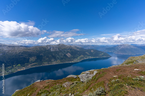 Fototapeta Naklejka Na Ścianę i Meble -  Hiking the famous Dronningstien (the Queen’s route). Stunning view of the Sørfjord, Hardangerfjord and Folgefonna glacier from the Hardangervidda plateau, Hardanger, Norway.