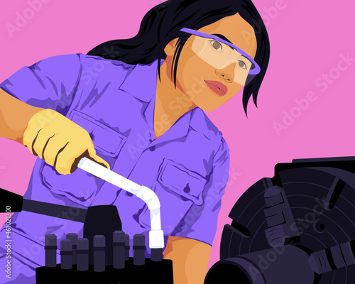 Female graduate industrial engineer working with heavy machinery  