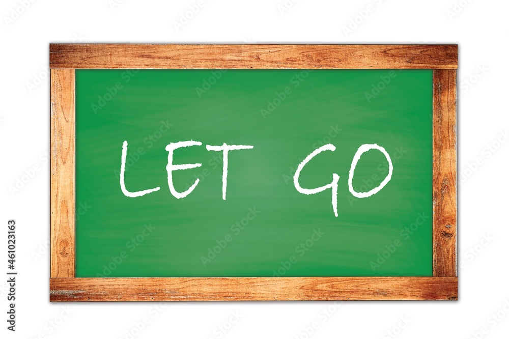 LET GO text written on green school board. LET GO text written on green school board.