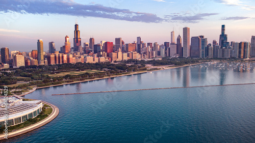 Aerial cityscape with Shedd Aquarium in foreground at sunrise, Chicago, Illinois, USA photo