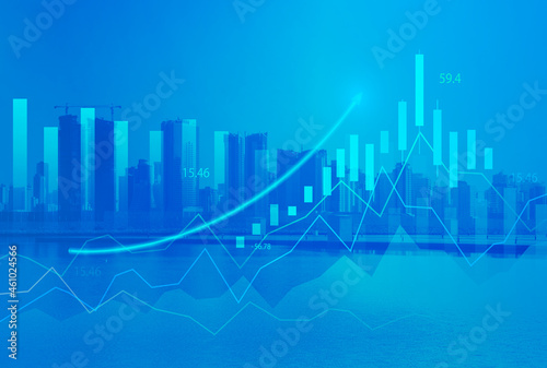 Stock market digital graph chart on LED display concept. A large display of daily stock market price and quotation. Indicator financial with buildings background © Ali Alawartani