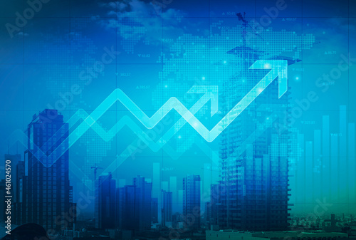 Stock market digital graph chart on LED display concept. A large display of daily stock market price and quotation. Indicator financial with buildings background