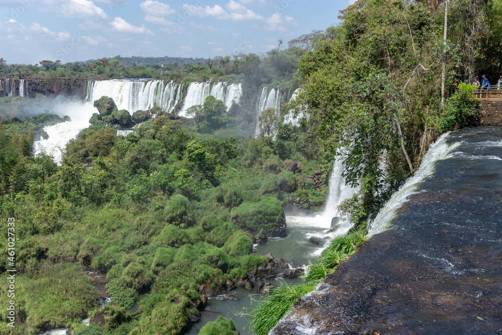Iguazu Falls, located on the border of Argentina and Brazil, is the largest waterfall in the world. Iguazu Falls, located on the border of Argentina and Brazil, is the largest waterfall in the world.