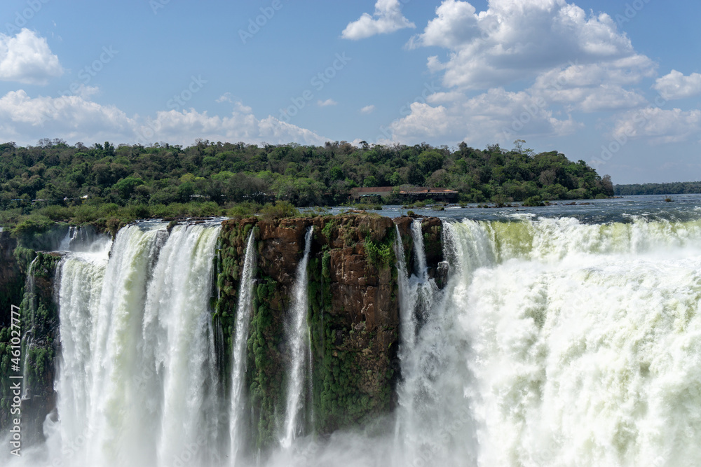 Iguazu Falls, located on the border of Argentina and Brazil, is the largest waterfall in the world. Iguazu Falls, located on the border of Argentina and Brazil, is the largest waterfall in the world.