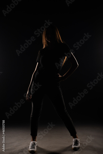 Silhouette of attractive girl posing