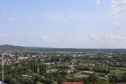 view of the city. Scenic view of the town in the mountains on a cloudy summer day.