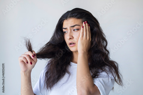 Woman have damaged and broken hair, loss hair, dry problem concept.	