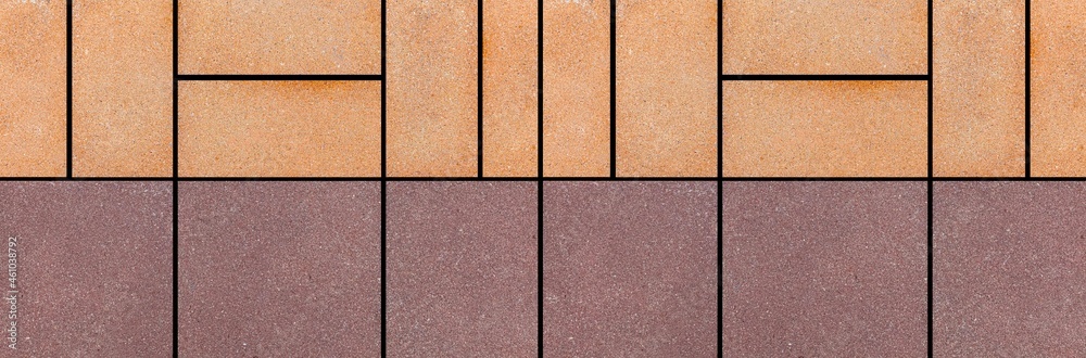 Fototapeta premium Panorama of Brown granite tiled wall with vintage pattern texture and background seamless