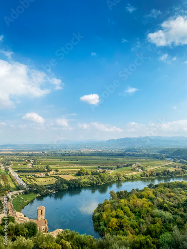 Ebro River passing through Miravet, Spain photo
