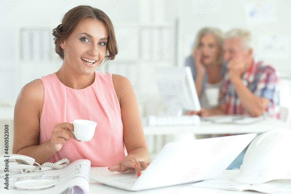 Portrait of beautiful young businesswoman architect working in office Portrait of beautiful young businesswoman architect working in office