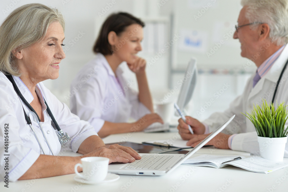 Portrait of professional doctors working in cabinet Portrait of professional doctors working in cabinet