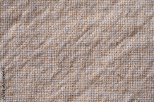 Close-up of beige fabric made of linen